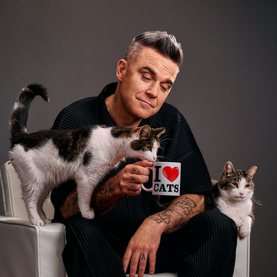 Felix and Robbie Williams team up in a purrfect pairing
